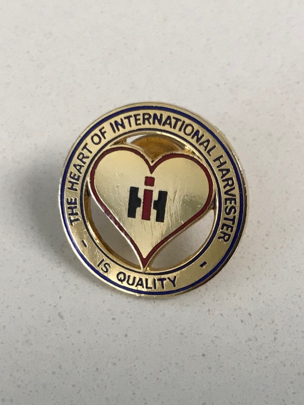 Vintage The Heart of International Harvester is Quality Brooch Hat Lapel Pin
